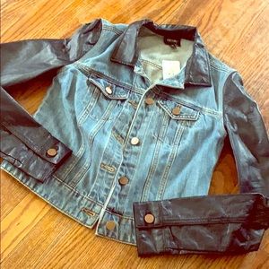 Jean jacket. Black leather sleeves